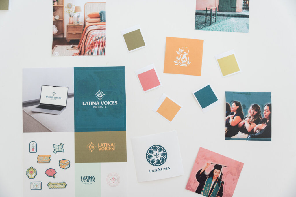 Color swatches, photos, and logo mockups all scattered around a table to help show the difference between a personal brand vs business brand