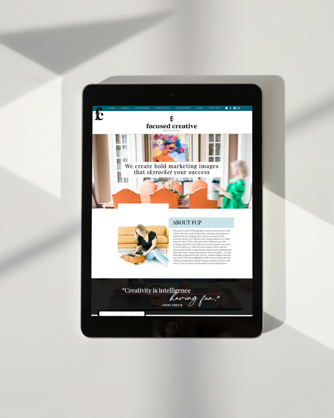 a tablet with a website page for focused creative 