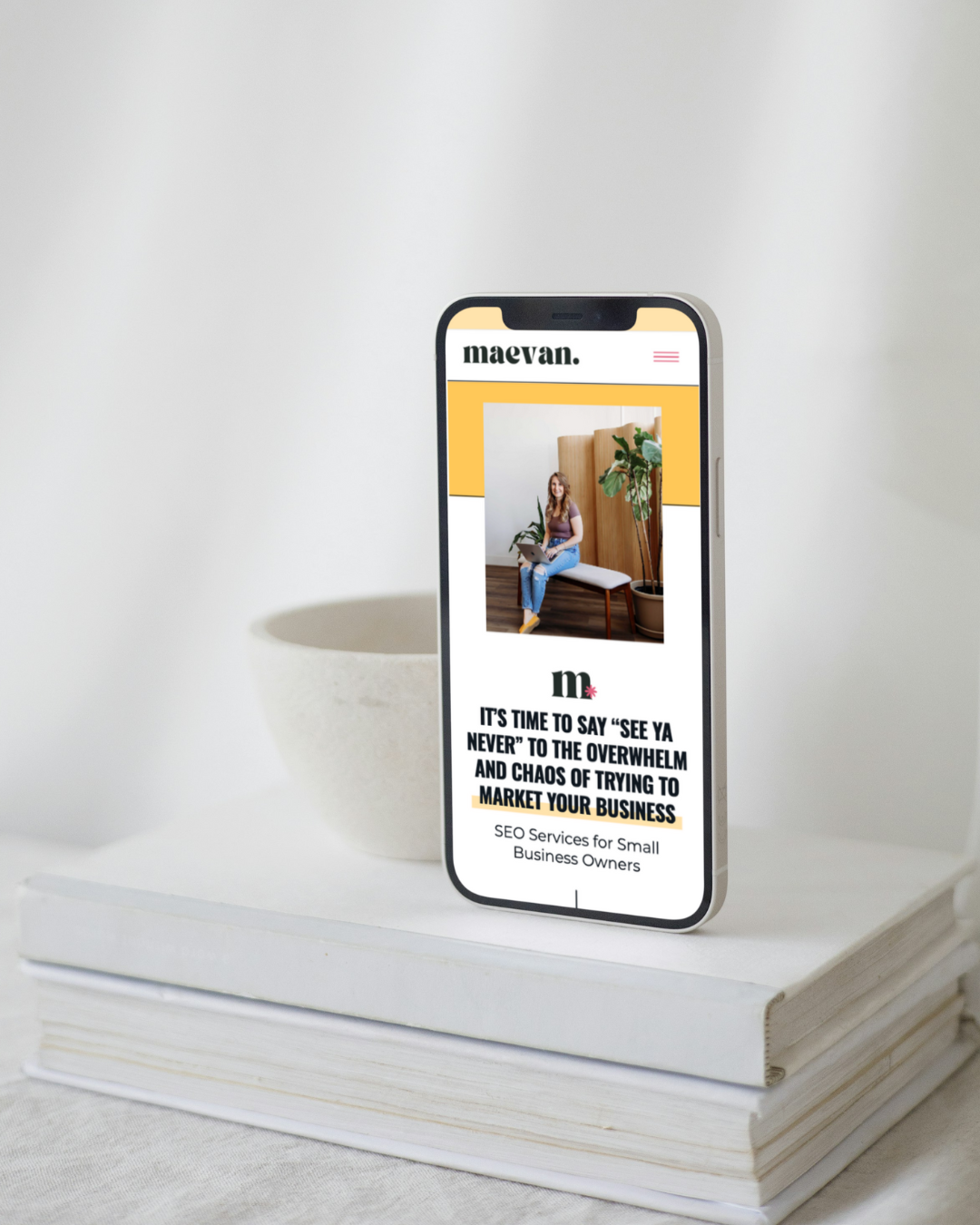 a phone displaying the website for maevan marketing 