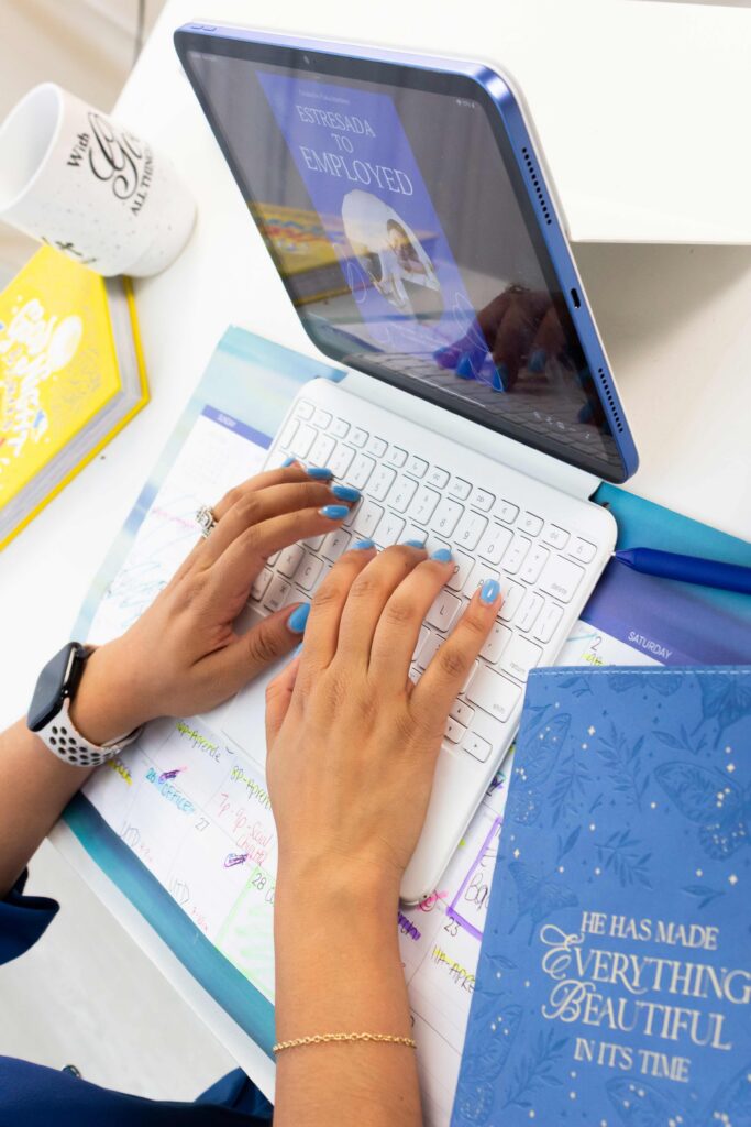 Business owner reviewing website design, SEO, and marketing strategy on a laptop.